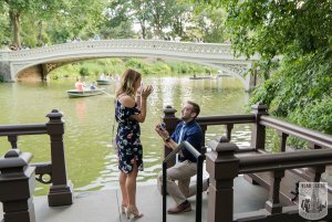 Wedding proposal by Bow Bridge in Central Park