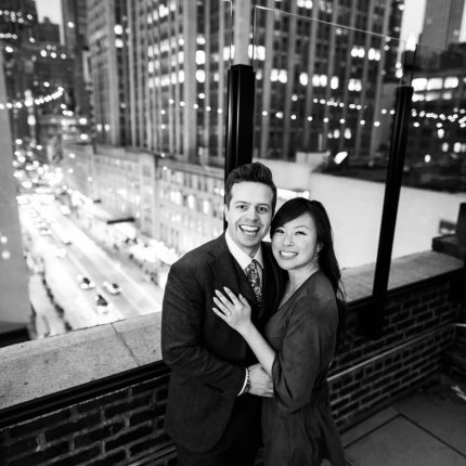 Wedding proposal on a private rooftop with Empire State Building view