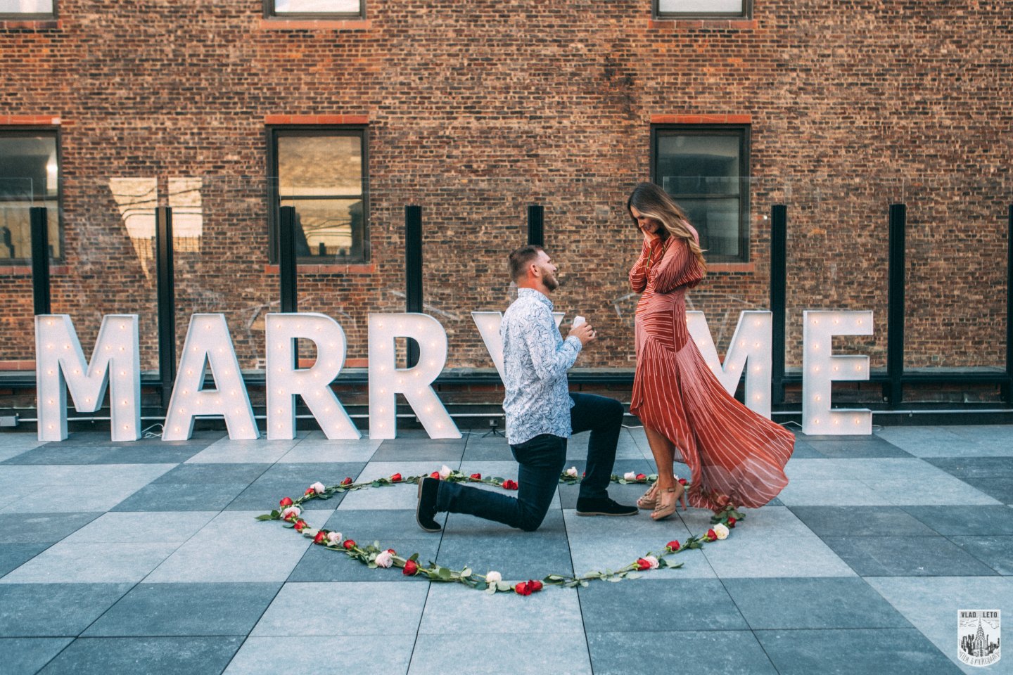 Large Marry Me letters Proposal on a Private Rooftop