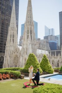 Rooftop proposal at 620 Loft & Garden: hedges, a reflecting pool and St. Patrick's Cathedral behind